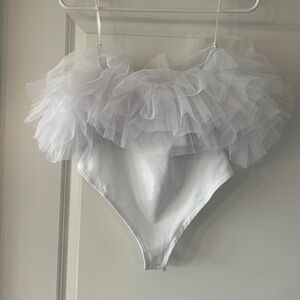 Free people. Size small. White body suit. Worn once for my bachelorette party!